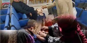 سندھ پولیو کیسز وارننگ کے دوران پولیو ورکر بچوں کو ویکسین دیتے ہوئے