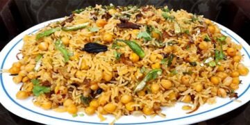 مزیدار چنا پلاؤ پلیٹ میں سجا ہوا