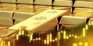 ڈیجیٹل ترازو پر سونے کے بسکٹ اور زیورات، جو پاکستان میں سونے کی قیمتوں میں ہونے والے اضافے کی عکاسی کر رہے ہیں